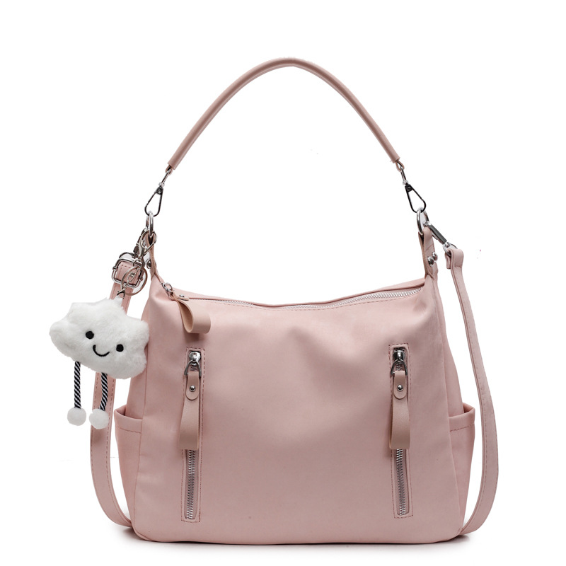 Bolsa suave Pitot para mujeres de gran capacidad 2025 nueva alta sensación de bolso de mano de viaje simple mochila de bolsillo casual