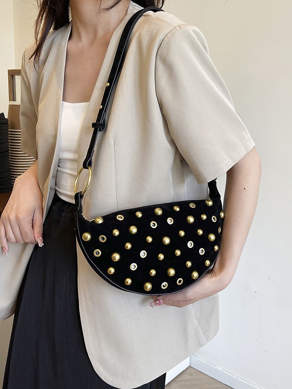 Bolso para mujeres 2025 nueva moda europea y americana estilo punk remache bolso de bolsillo de hombro de alta calidad lujosa bolsa de mochila