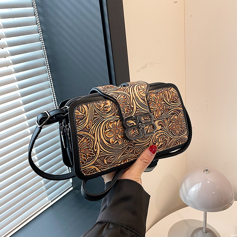 Bolso de mano de lujo retro luz 2024 nueva moda versátil bolso de hombro de mujer relieve dibujado a mano bolso de tres capas