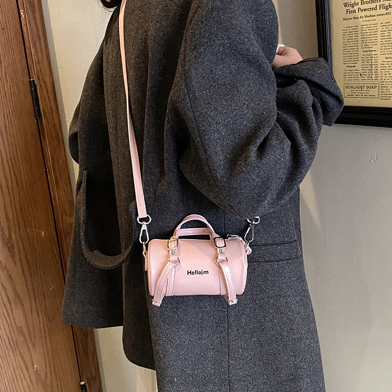 Nicho coreano para niños y niñas bolsas cilíndricas exquisitas mini mochila de hombro para bebés 2026 nueva bolsa infantil transfronteriza
