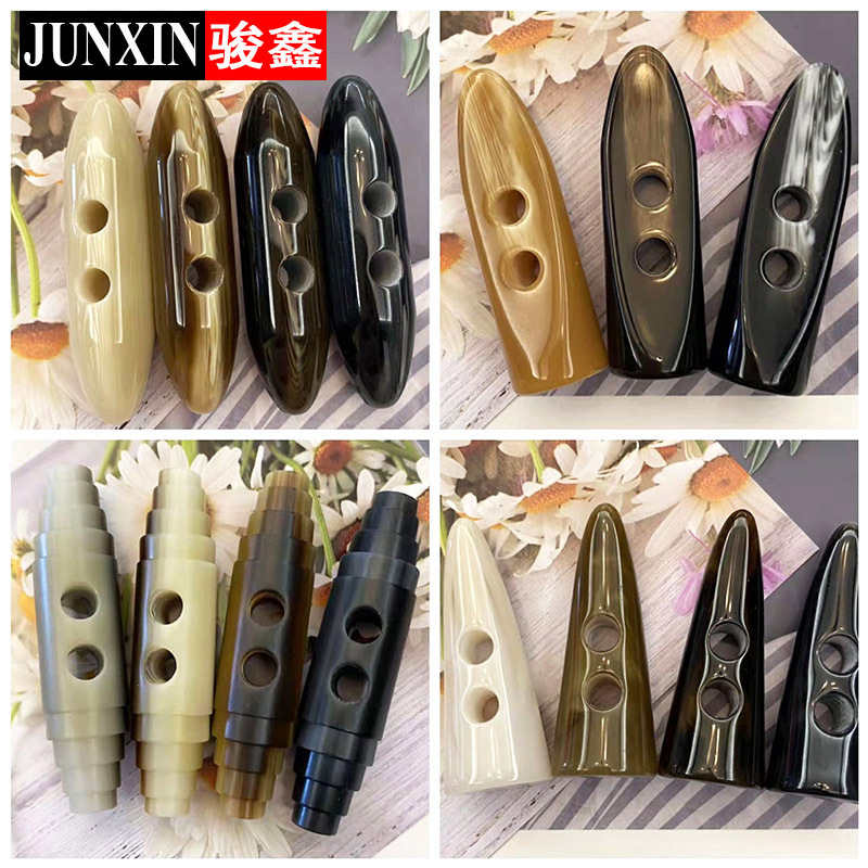 现货树脂双孔橄榄扣大衣外套纽扣雪地靴帽子辅料仿牛角扣对扣钮扣