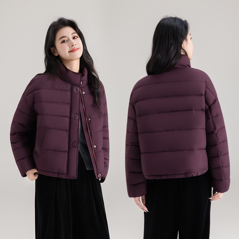 Capa de plumón corta de mujer 2025 ropa de invierno de moda simple de color sólido con una chaqueta caliente de cuello pequeño image 2