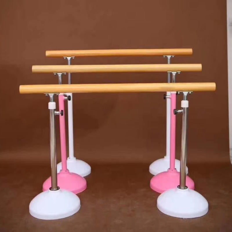 Portable, height-adjustable dance barre for adults and children; suitable for school dance studios and practice rooms.