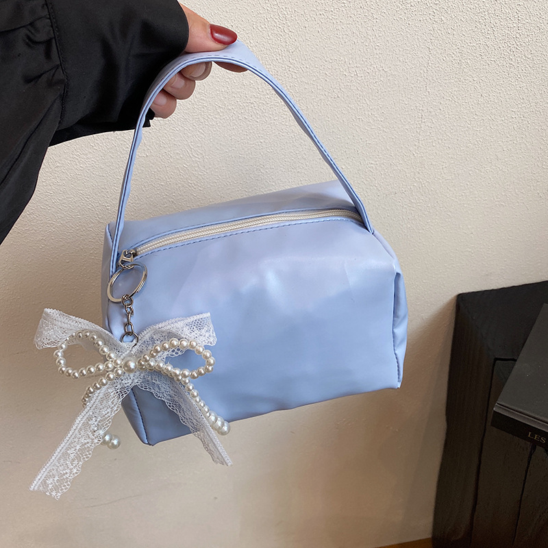 Nicho Zhong fresco dulce bolso de braza para mujeres 2025 primavera y verano nuevo estilo de alta calidad de moda de viaje de hombro bolso de mujer estilo extranjero