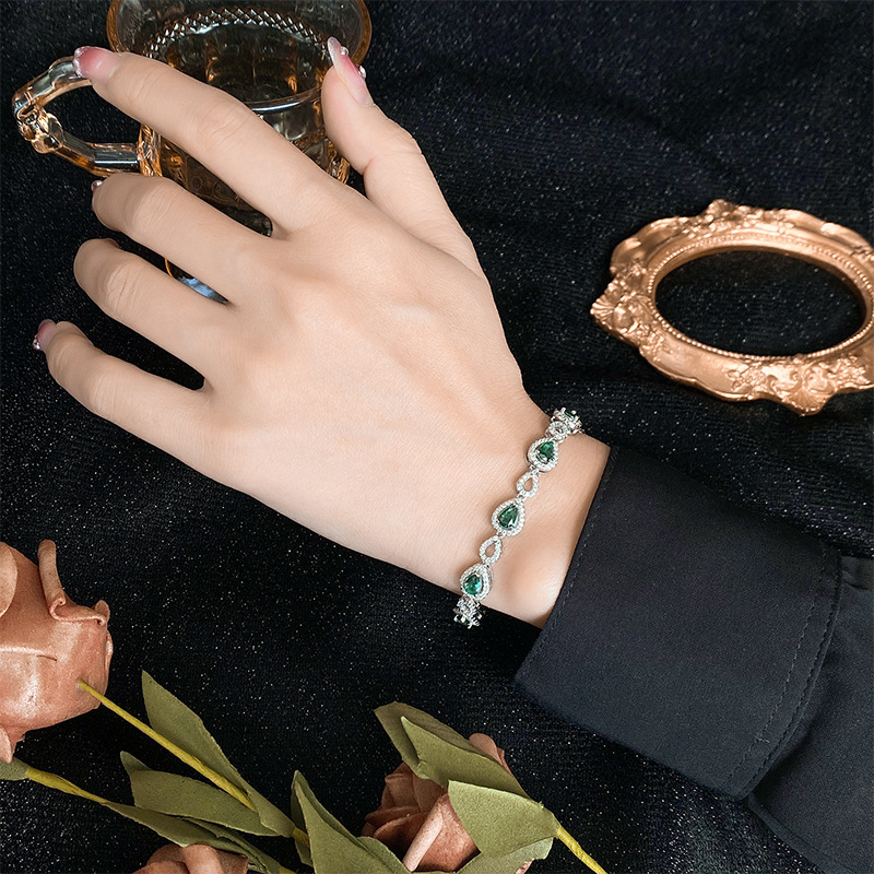 Otoño e invierno nuevo estilo Zhuang Sheng joyería europea y americana retro corindón artificial luz lujo completo diamante pulsera retro piedra principal 4*6