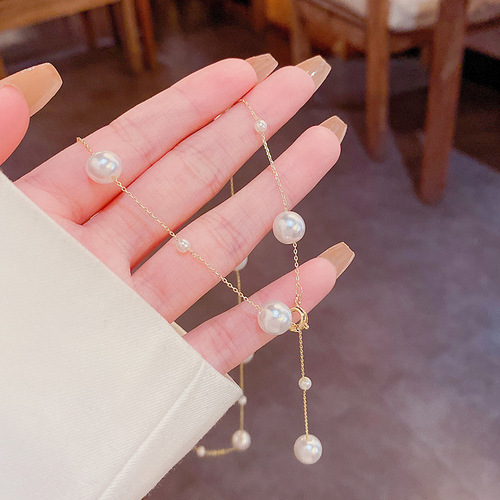 Korean light luxury niche pearl necklace for women, a four-wear high-end design, the same clavicle chain as the internet celebrity