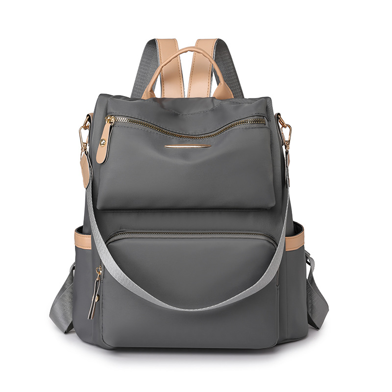 Mochila antirrobo para mujer 2025 primavera nuevo estilo color de contraste mochila para mujer moda viajero multifunción mochila de doble uso
