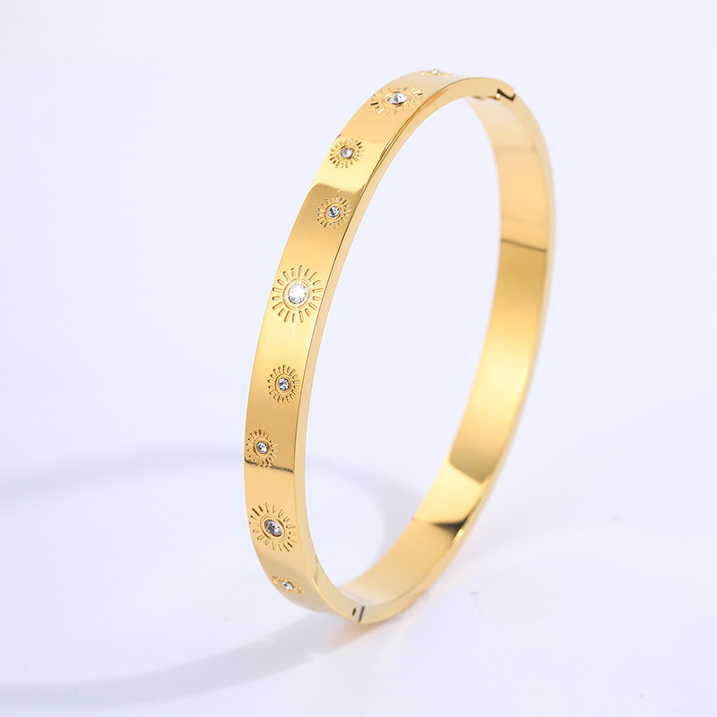 Brazalete de acero de titanio rune sol de Europa y América con diamantes ligeros de lujo nicho brazalete de oro de mujeres de apertura transfronteriza brazalete de alto nivel