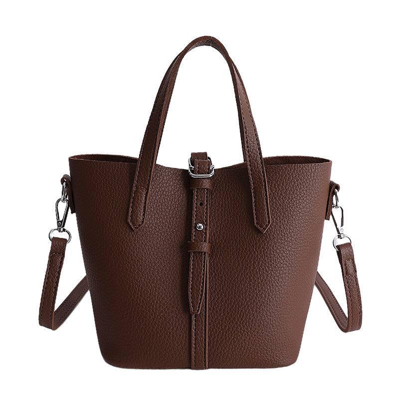 Nicho coreano canasta de platos portátiles bolsos de cubo para mujeres 2026 ventas calientes nuevas bolsas de hombro casuales de gran capacidad