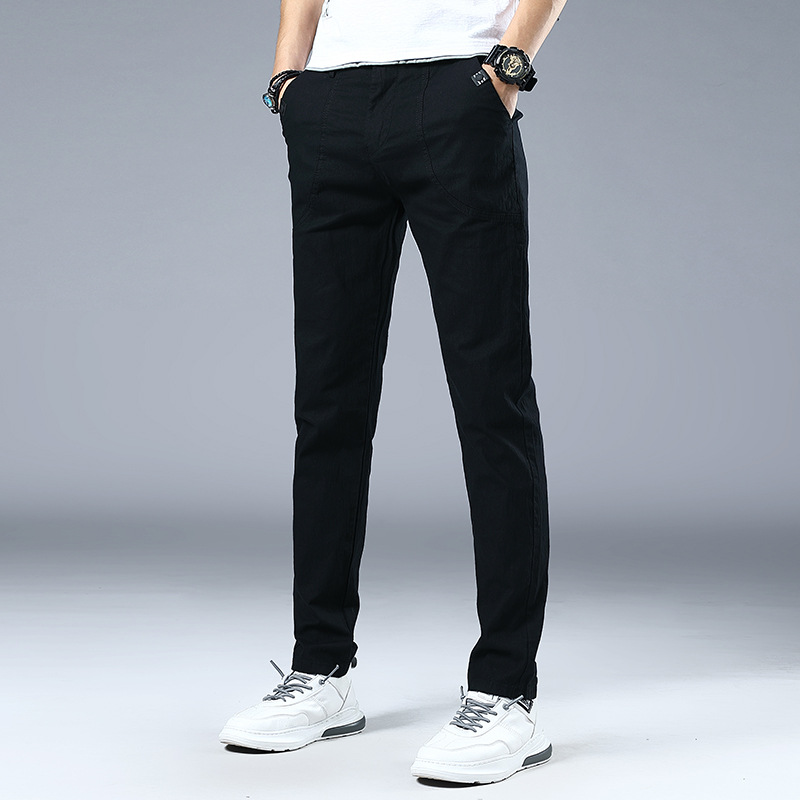 Four Seasons pantalones casuales elásticos para hombres al por mayor de los hombres jóvenes estilo coreano SLIM-Fit adelgazamiento simple moda lápiz pantalones hombres