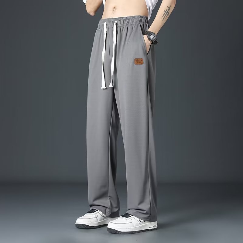 シャツの少ない服装の氷のズボンの夏の新型の香港風のゆったりした大きいサイズのストレートの広腿のズボンの垂れ感の薄いタイプのカジュアルなズボン|undefined