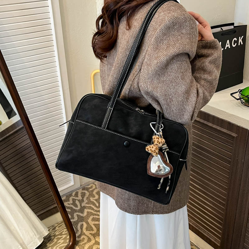 Bolsa de bolos de alta sensación para mujeres otoño / invierno 2025 nueva gran capacidad de transporte de hombro bolsa de mano bolsa de almacenamiento