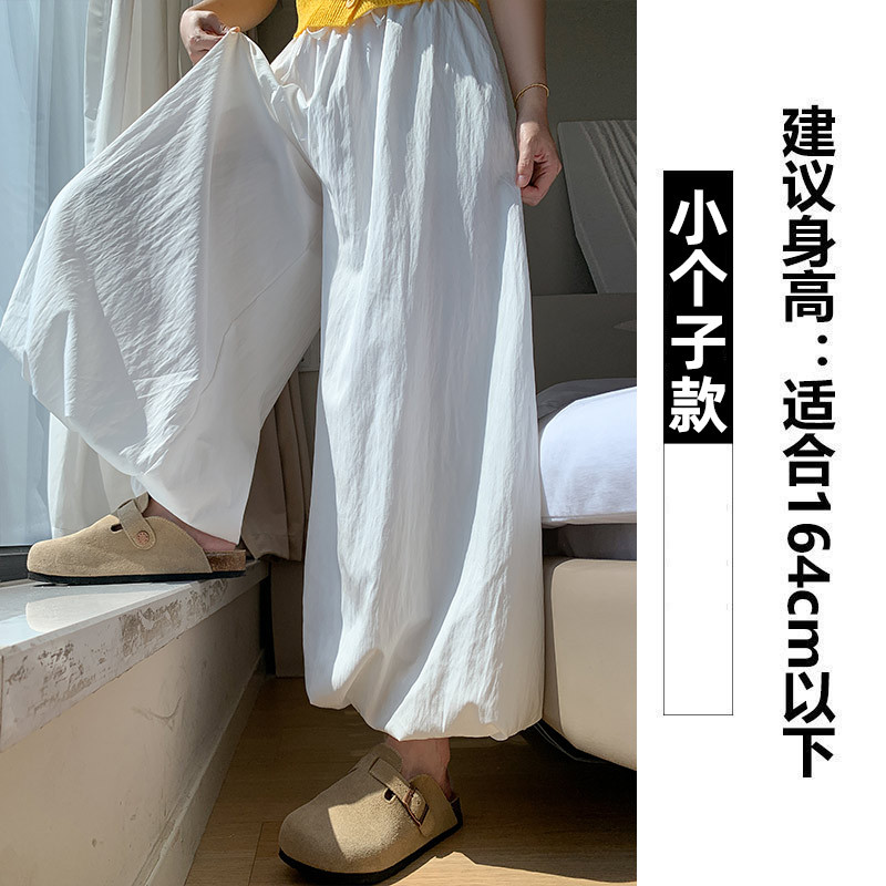 Pantalones de falda de capullo de flor de seda de hielo para mujer estilo fino de verano 2025 nuevo estilo casual perezoso pantalones de pierna ancha pequeños bombachos amarillos