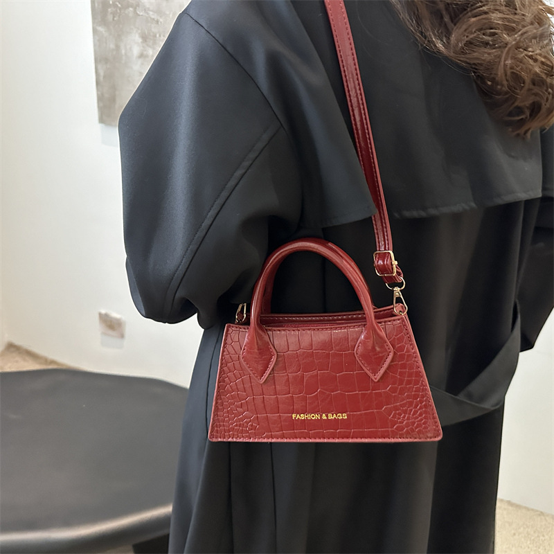 2025 nuevo bolso de mensajero casual ins textura retro simple estilo occidental pequeño bolso de mano de color sólido de moda