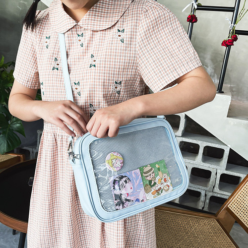 Japanese ins animation peripheral cute personality versatile street shooting soft girl student pain bag transparent girl doll bag