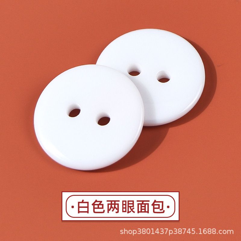 Botón de pan de cuatro ojos Camisa blanca y negra Cortavientos Botón de resina Botón de resina de dos ojos Botón de pan de cuatro ojos con borde fino transparente