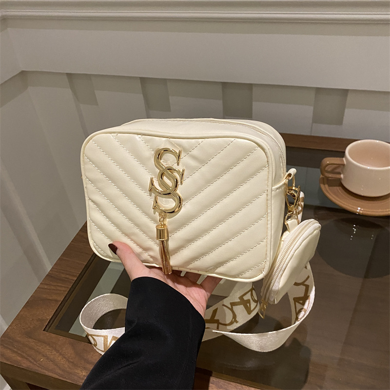 2025 primavera y verano nueva personalidad de moda bolso de niño hermoso casual simple bolso de mensajero textura estilo occidental bolso cuadrado pequeño de un solo hombro