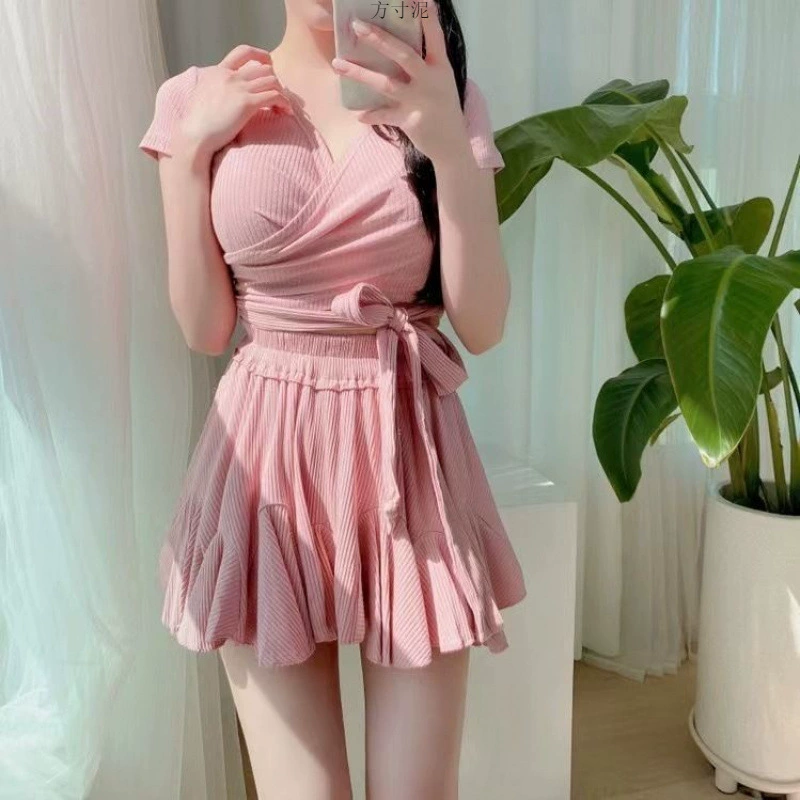 Split fitted supporting brand swimwear, high waist