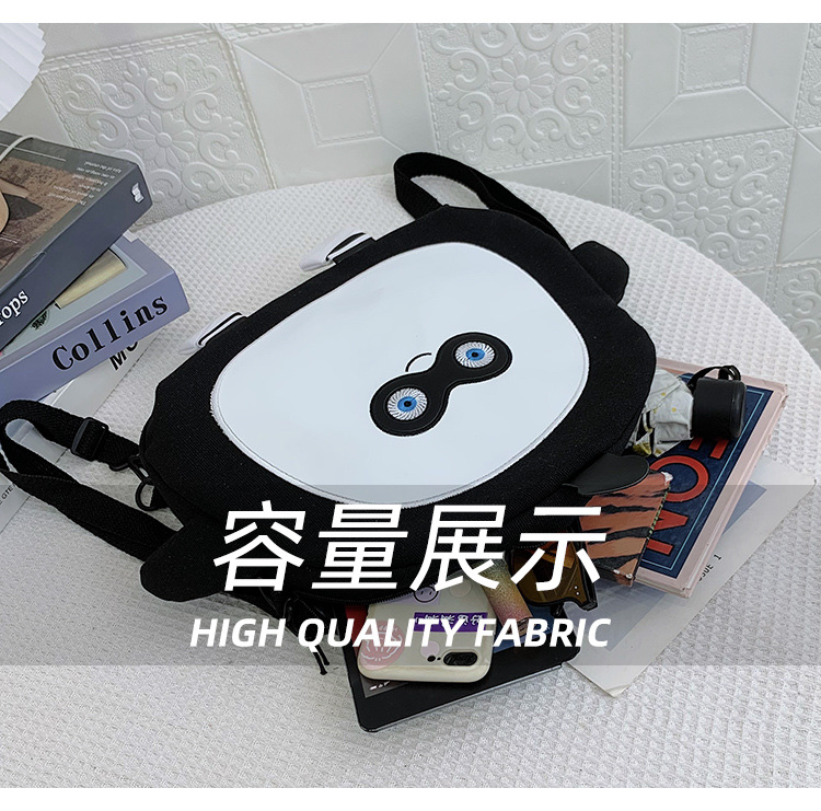 The new 2024 children's egg-shaped party backpack is a cute cartoon canvas single-shoulder bag and a fashionable and stylish small backpack undefined