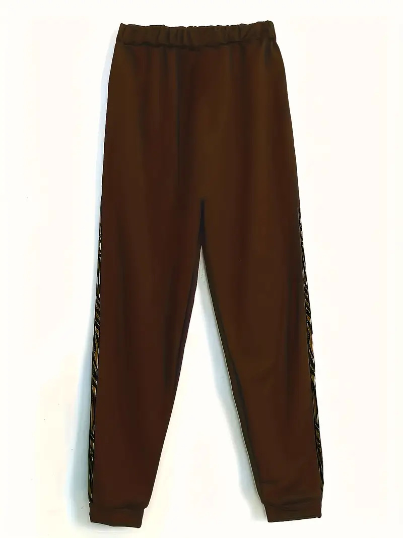 Conjunto de pantalón blanco elegante para mujer estampado leopardo_voghion.com