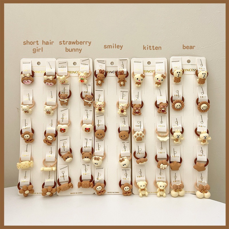 La banda de goma marrón leche simple y Linda para las mujeres no duele la banda del pelo de la cuerda del pelo de la cola de caballo del tamaño pequeño para las mujeres