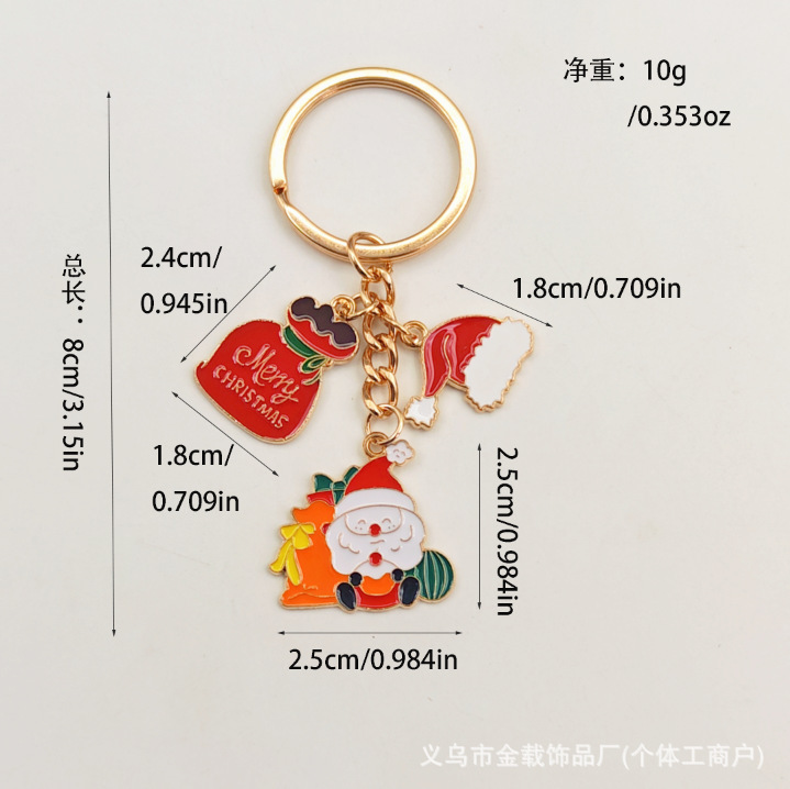 クリスマスのキーチェーンのクリスマスツリーは精巧なサンタクロースのヘラジカのプレゼントの箱の鈴のアクセサリーの包みのペンダントを飾ります。|undefined