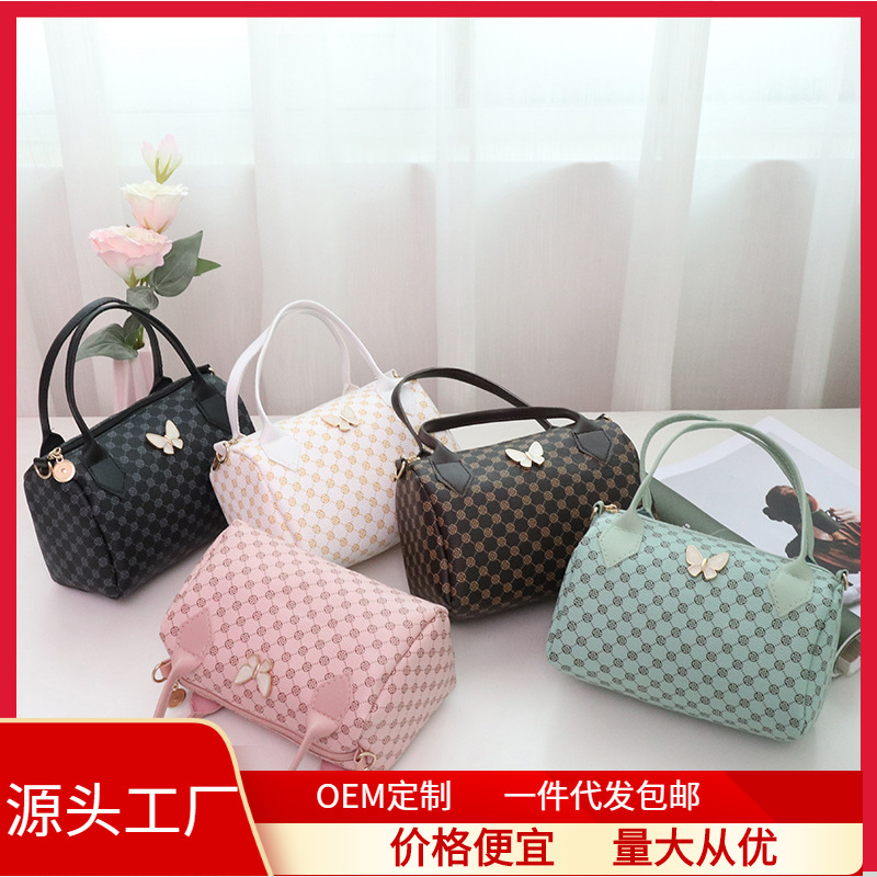 Bolso de mujer 2023 nuevo círculo impresión colgante mariposa bolso de almohada de mano bolso de teléfono móvil casual bolso de comercio exterior