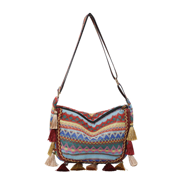Bolsos grandes populares de este año 2025 verano nuevo bolso femenino estilo étnico color contraste bolso bandolera retro borla bolso bandolera