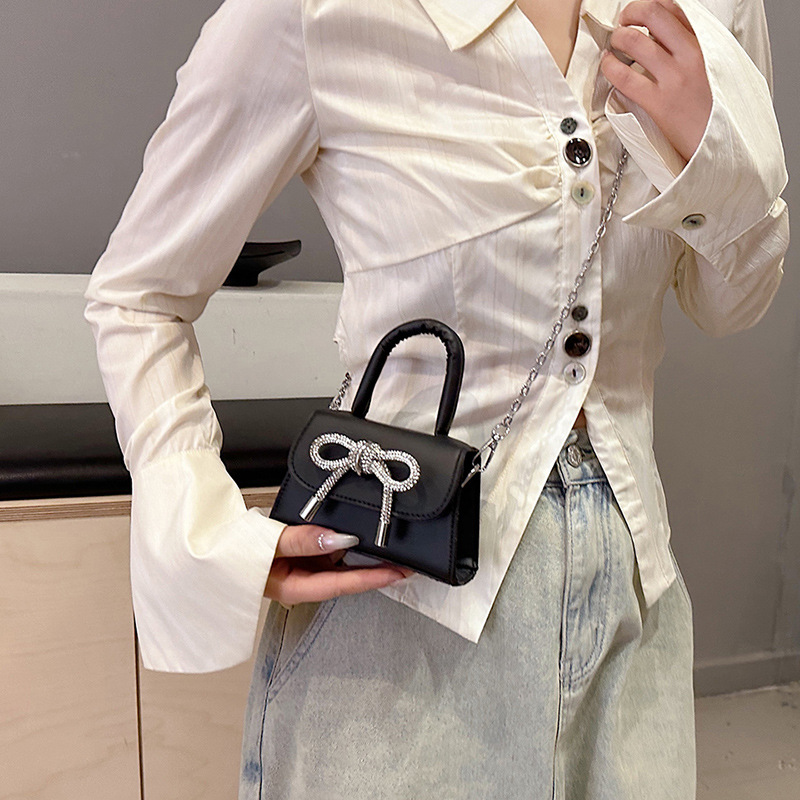 Ins niche French textured bag female 2024 new bow small square bag stylish shoulder messenger bag_voghion.com