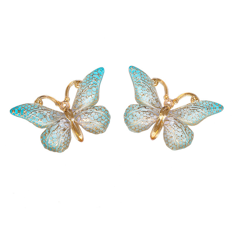 Colgante de mariposa transfronteriza de color creativo de personalidad acrílico europeo y americano bolsas de auriculares bolsas de decoración accesorios