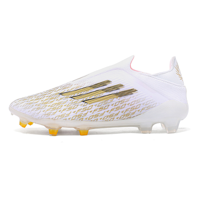 2025 nuevas zapatillas de entrenamiento de pareja transfronterizas zapatillas de entrenamiento de moda de clavos largos zapatos de fútbol juveniles de hombre y mujer