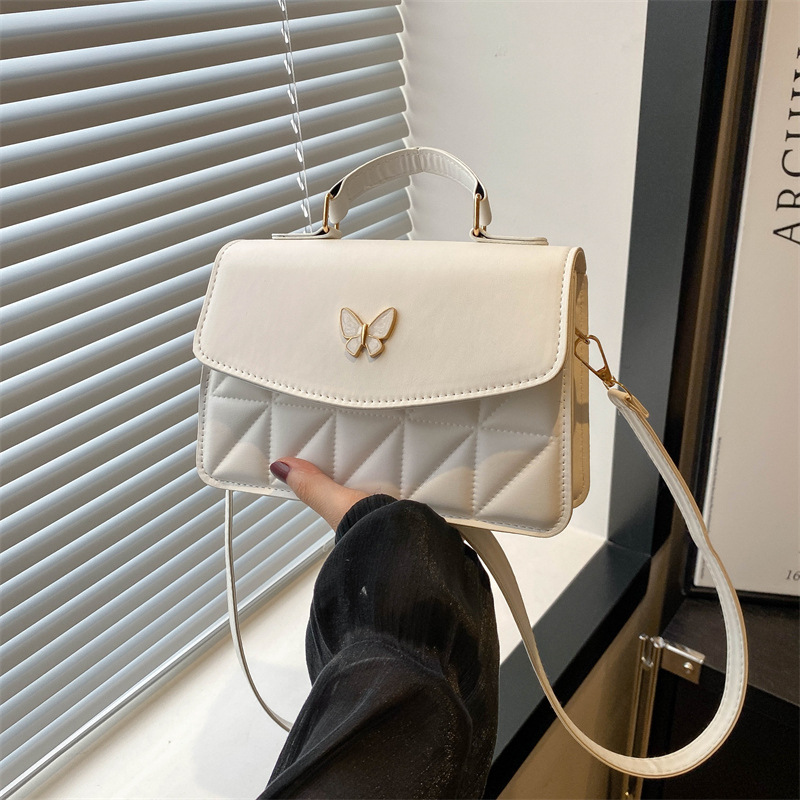 Bolsas para mujeres 2024 verano nuevo diseño de nicho de mariposa de alta calidad estilo de moda de diamante universal de hombro pequeño bolso de moda