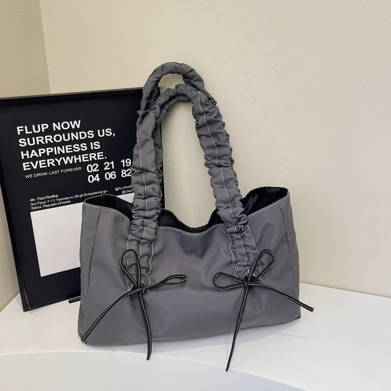 Bolsos de arco de textura de alta calidad, bolsas de nylon de alta capacidad, damas 2025, bolsas de moda, bolsas de nylon casuales de gran capacidad