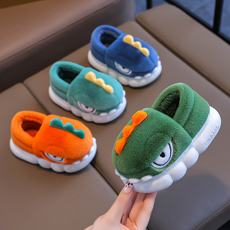 Otoño y invierno zapatillas de algodón para niños dinosaurios cálidos y bolsas de pelusa con zapatos de algodón antideslizantes para niños caseros