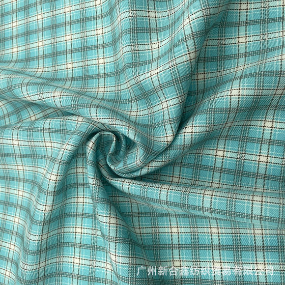 Spring and Summer Plaid JK fabric JK uniform pleated skirt fabric in stock supply yarn-dyed plaid fabric polyester Plaid