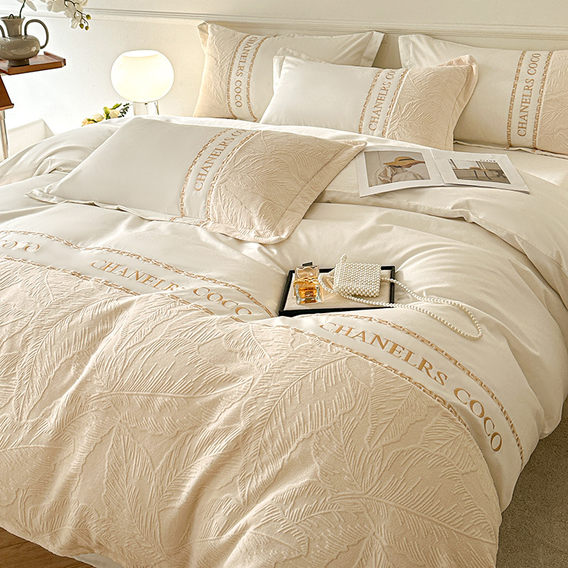 Otoño y invierno tallado algodón conjunto de cuatro piezas lujo ligero de alta sensación de 100 sábanas de cama de algodón puro ropa de cama