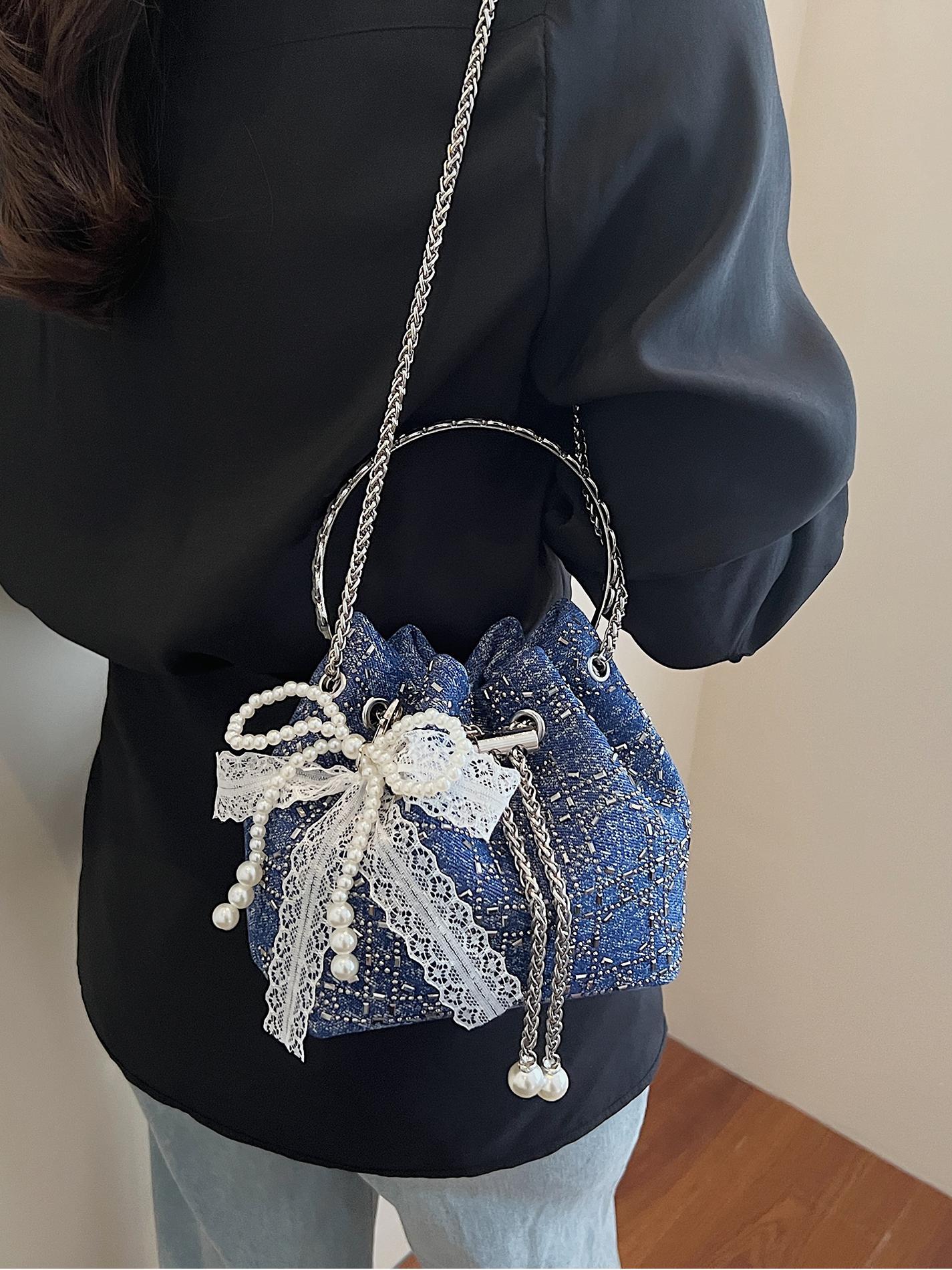 Verano popular taladro caliente bolso de cubo de mano mujer 2025 nuevo estilo coreano denim casual mochila para trabajar