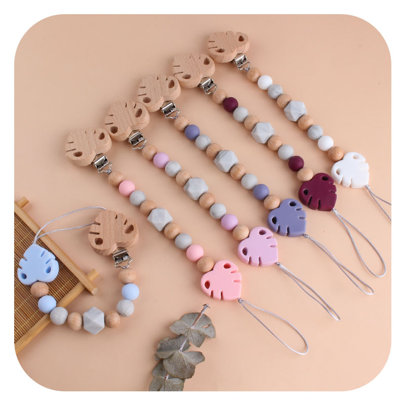 Suministros para bebés creativo clip de chupete de hoja de haya juguete mordedor bebé Cadena de chupete de hoja de silicona cadena anti-caída