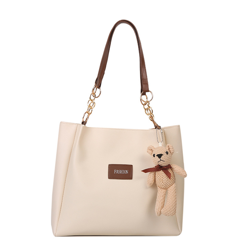 Bolsa de asas de gran capacidad de textura popular de este año para mujeres 2023 nueva moda casual estudiante bolsa de clase bolsa de cercanías