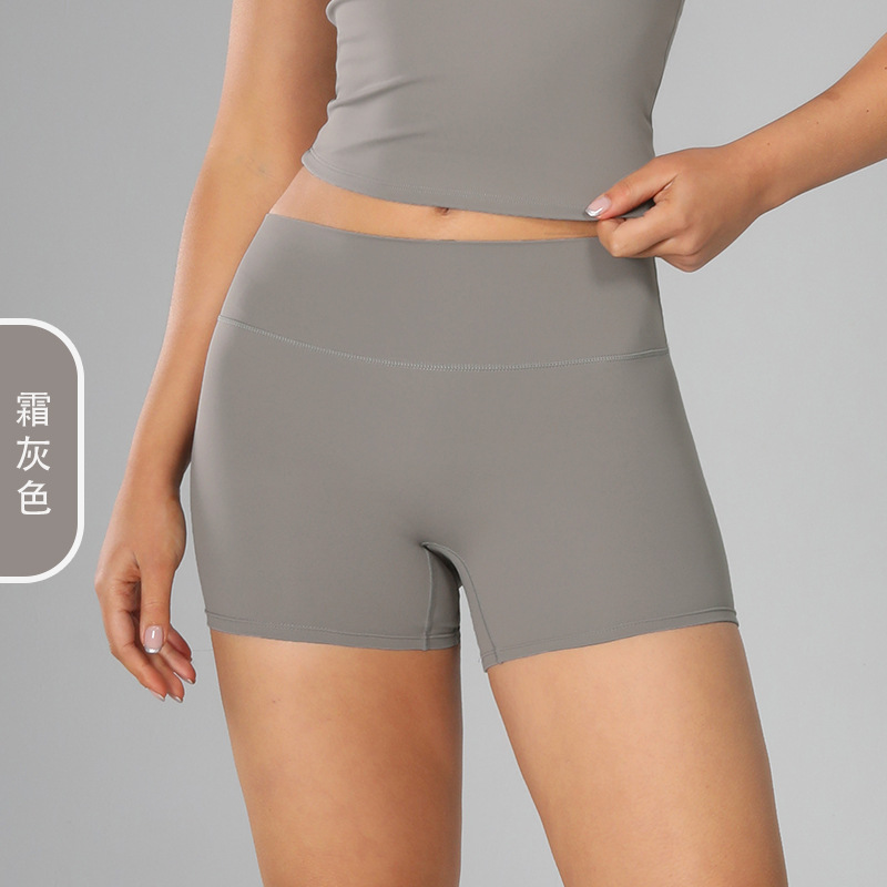 Europa y los Estados Unidos abrasivo transfronterizos pantalones cortos de yoga ajustados de cintura alta para mujeres pantalones de gimnasio abdominales para elevar las caderas para correr pantalones cortos deportivos 8519