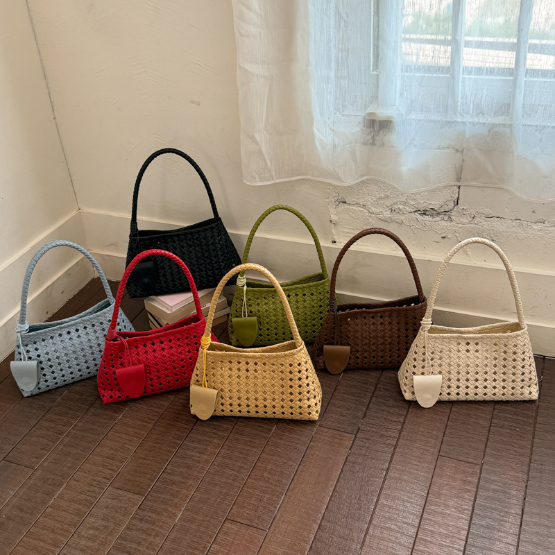Bolsa de brazo hueco para mujeres 2026 verano nuevo estilo francés lujoso viaje de hombro portátil bolso de palo