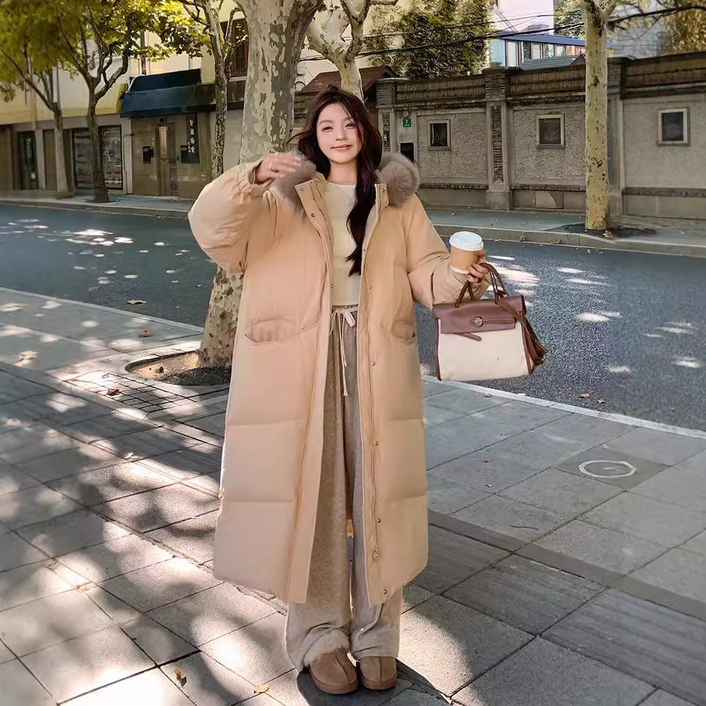 Gran abrigo de algodón de plumón largo de cuello de cabello para mujeres 2024 nuevo abrigo de algodón suelto de invierno grueso chaqueta de rodilla