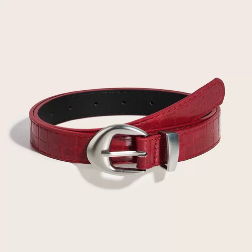 Red vintage-style niche commuter belt for women—fashionable accessory that complements skirts and denim jeans.