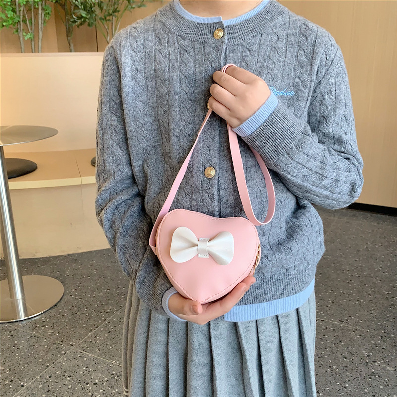 Dulce amor modelado niña pequeña bolso de hombro de dibujos animados arco bebé mochila 2026 nuevo bolso para niños