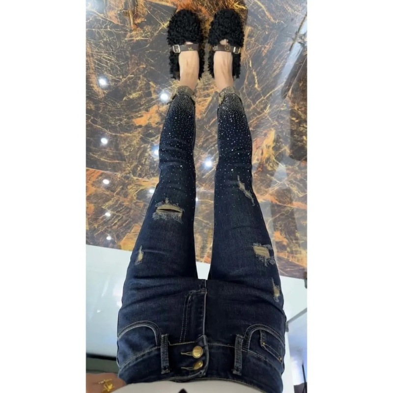 个性潮流假破洞弹力紧身烫砖牛仔裤女2025新款高腰显瘦铅笔小脚裤
