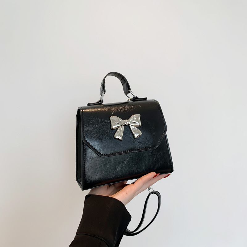 2025 nuevo estilo francés personalidad mochila de hombro de mujer alta sensación de moda simple de hombro de mano pequeña bolsa de mano coreana