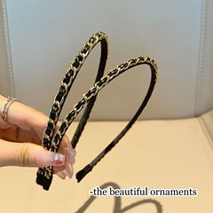 韓国版秋の新しい黒い香風の精巧なチェーンの細い辺のカチューシャは百合で髪を抑えて外に出ます。