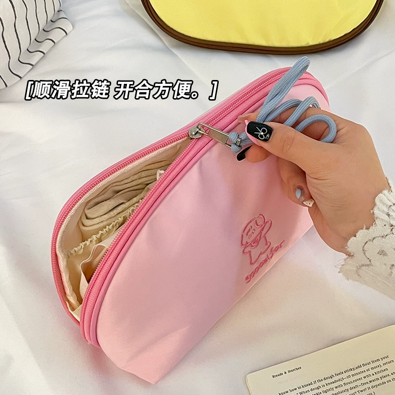 Слитное белье? Подводим к переводу: "Underwear, organizer bag for traveling, handheld suitcase, bra, tights, socks, container, three-in-one"