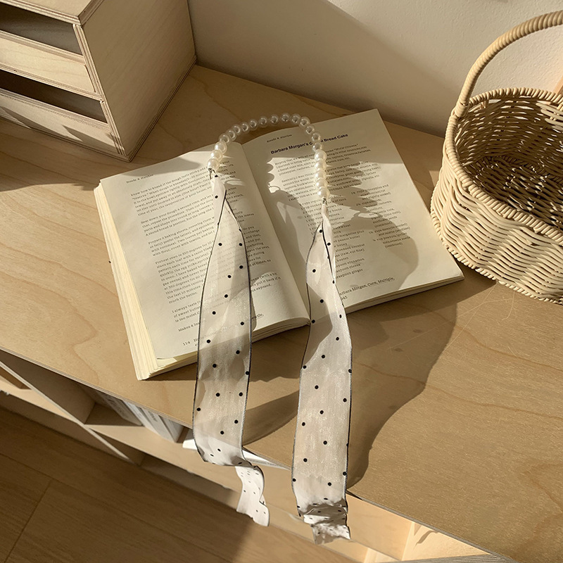 Pequeño punto de onda beige