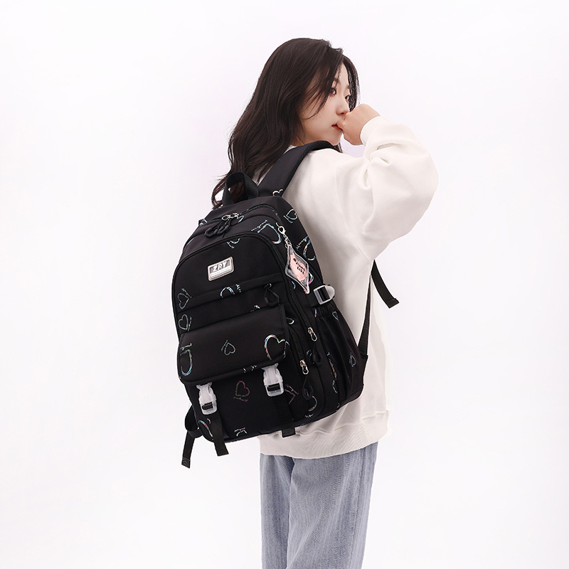 Mochila de nylon ligera de estudiante de escuela primaria de invierno para niñas transfronterizas mochila de estudiante de secundaria al por mayor entrega de una pieza